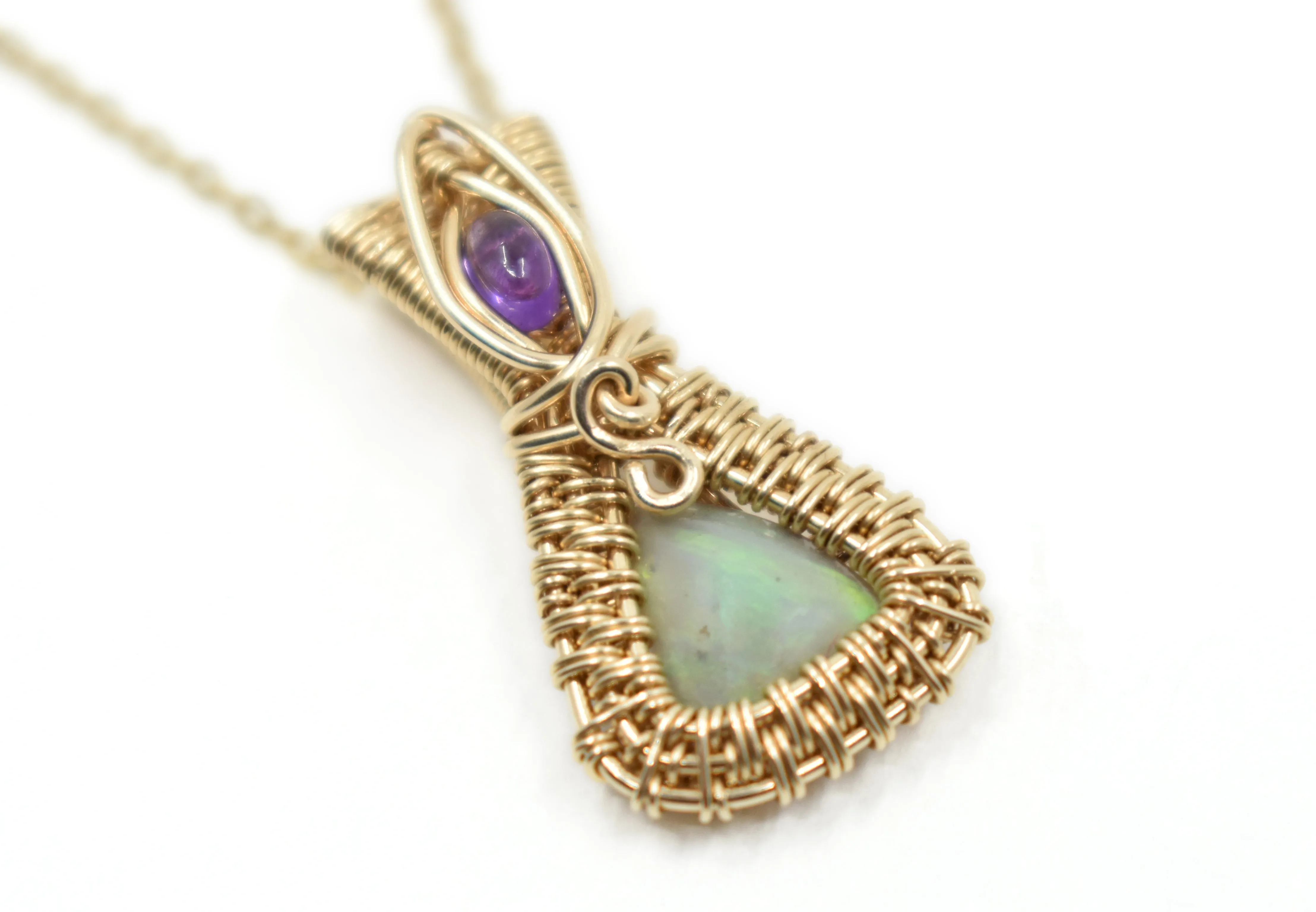 14kt Gold Filled Wire Wrapped Lightning Ridge Opal accented with an Amethyst from Zambia