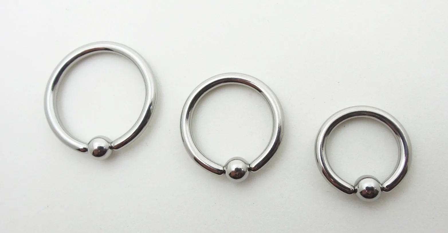Medical Grade 18ga Titanium captive bead rings. Vibrant colors!😍